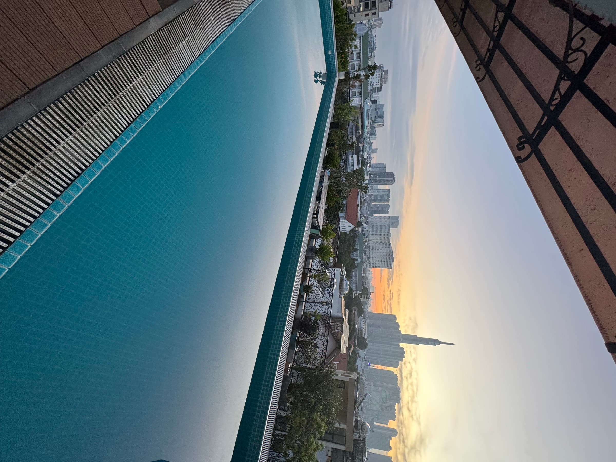 Rooftop view of the Ho Chi Minh City skyline at sunset